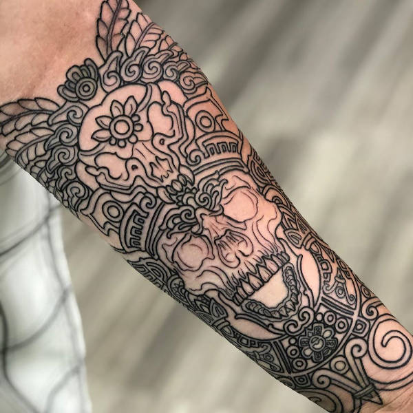A aztec tattoo on the arm